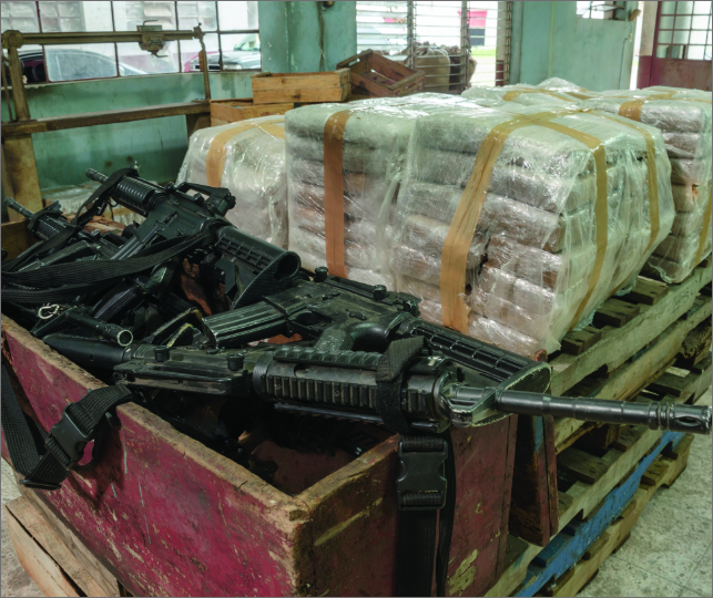 Crate full of guns and drugs